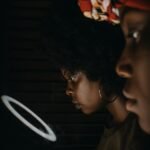 a man and woman looking at each other