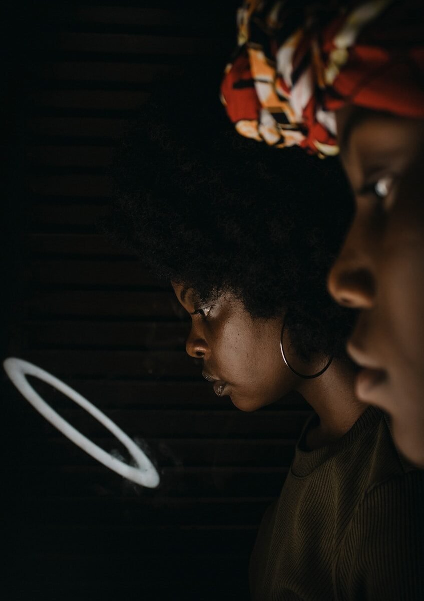 a man and woman looking at each other